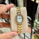 TORY BURCH THE OVAL GOLD TONE QUARTZ MOVEMENT
