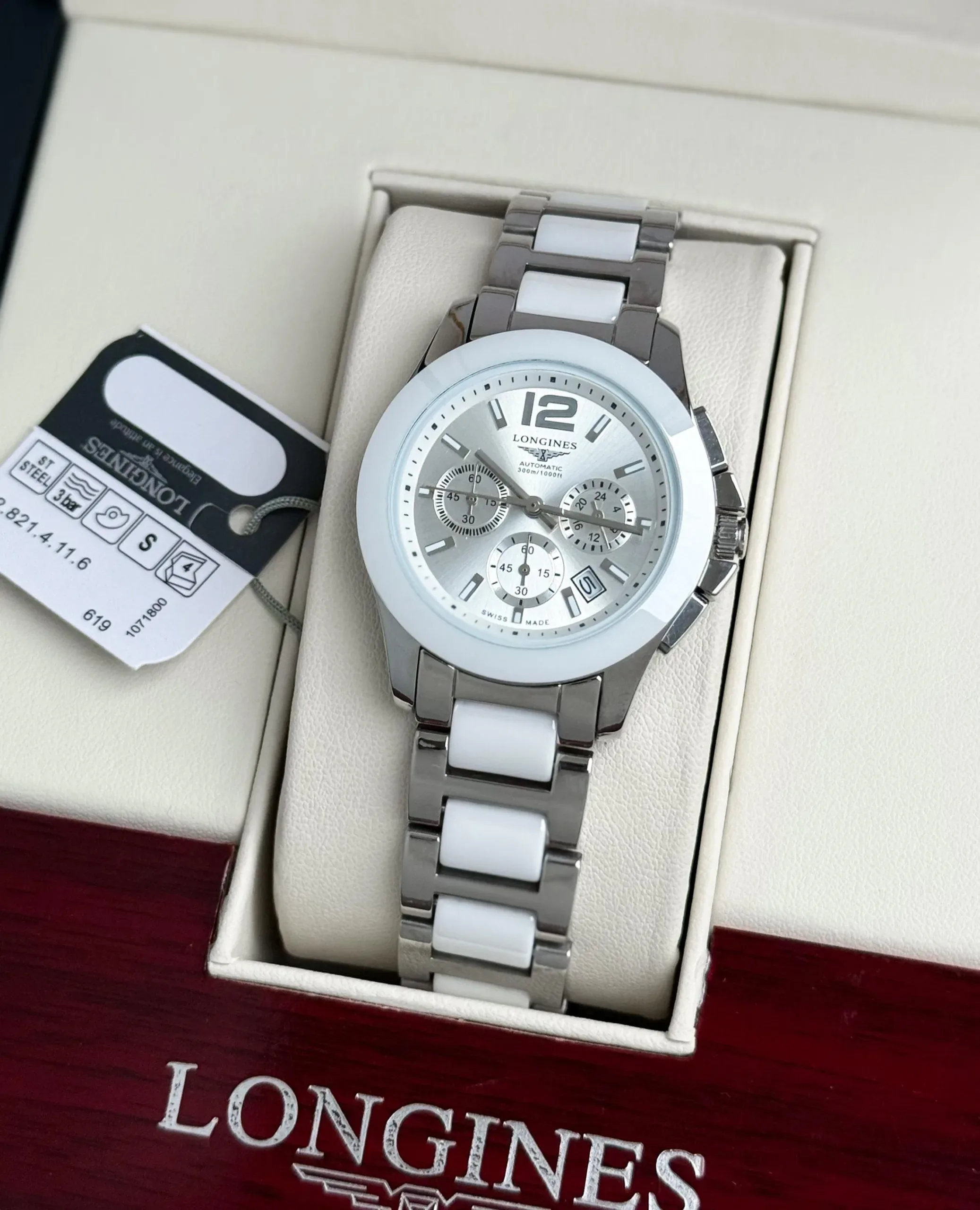 2025/11/IMG-20251114-WA0176-jpg.webp LONGINES WHITE DIAL & SILVER CERAMIC 7AAA PREMIUM - Image 1