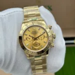 ROLEX OYSTER PERPETUAL DAYTONA AUTOMATIC GOLDEN DIAL