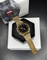 G SHOCK MONOCHROME STAINLESS STEEL GOLD BEZEL & BLACK DIAL - Image 2