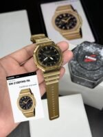 G SHOCK MONOCHROME STAINLESS STEEL GOLD BEZEL & BLACK DIAL