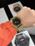 G SHOCK MONOCHROME STAINLESS STEEL GOLD BEZEL & BLACK DIAL - Image 3