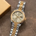 ROLEX OYSTER PERPETUAL DATE JUST GOLDEN DIAL AUTOMATIC