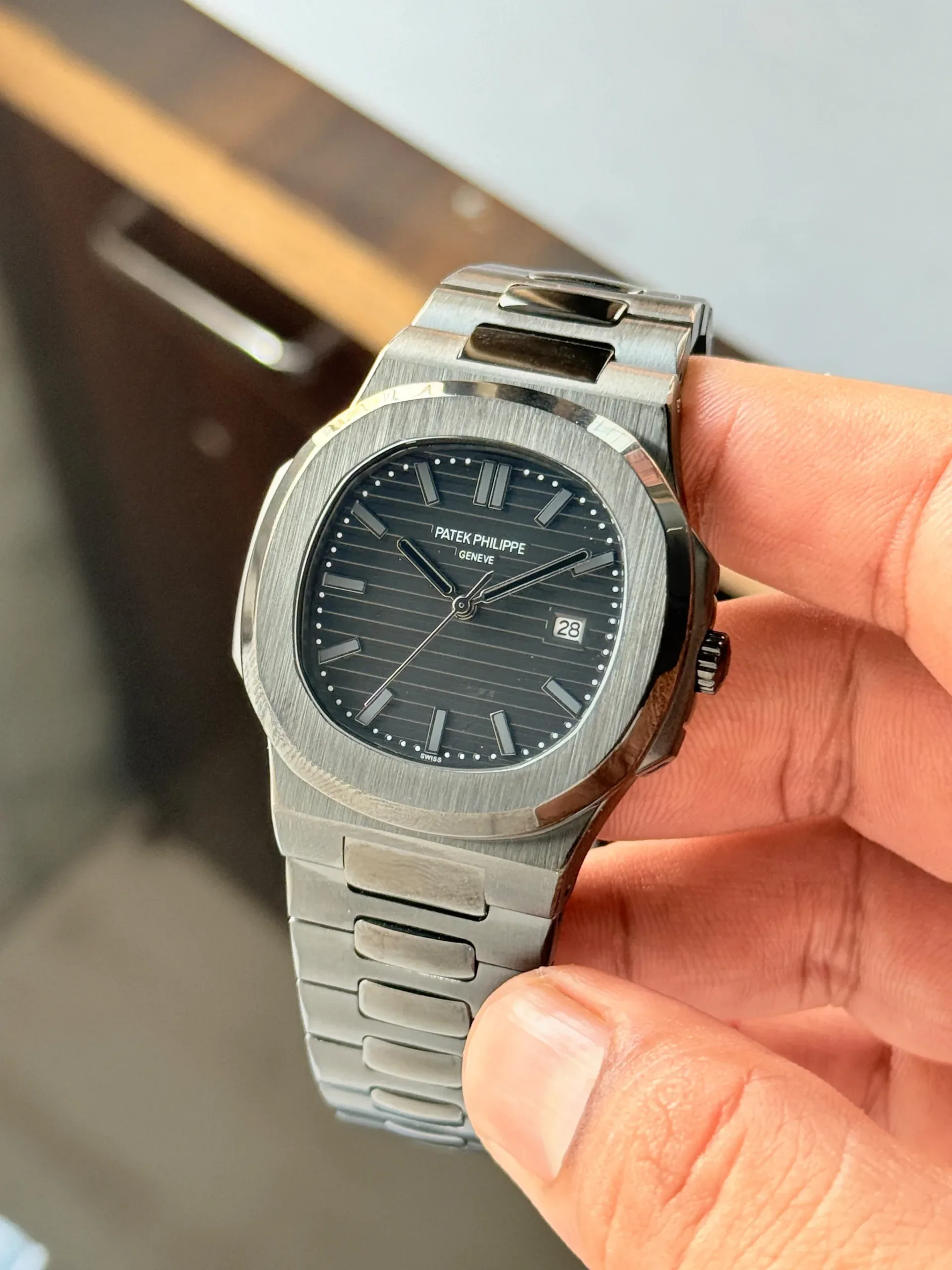 WhatsApp Image 2026-10-08 at 1.07.48 AM (1) Patek Philippe Nautilus Black Japanese Quartz - Image 1